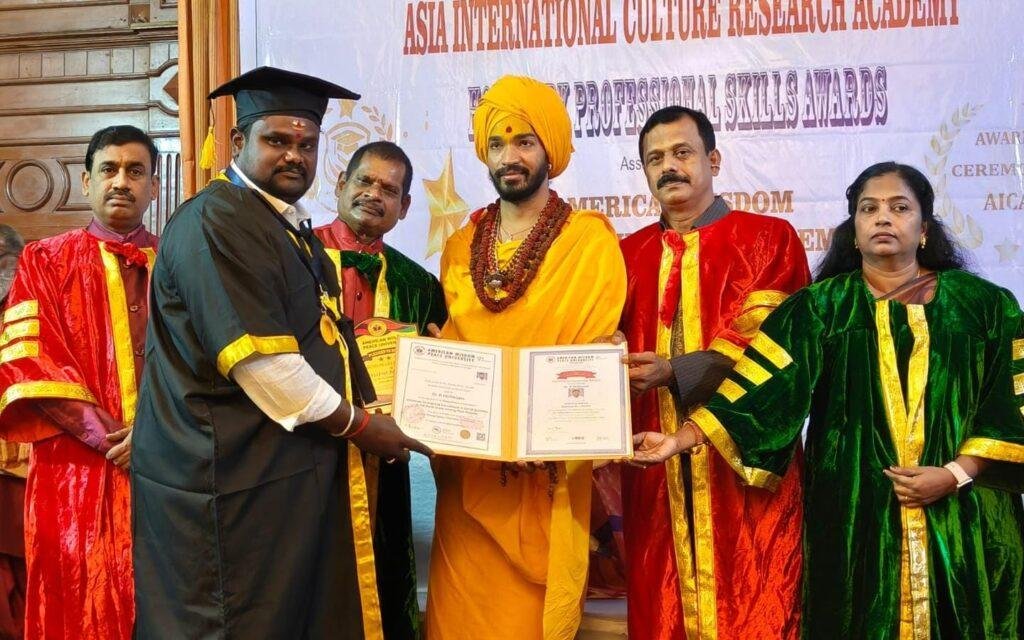 గంగమ్మ ఆలయ ఛైర్మన్ డా. ఆర్. మురుగన్‌కు అరుదైన గౌరవం